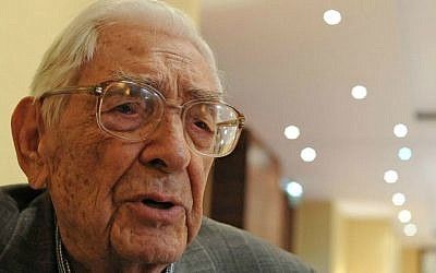 Rescuer Janusz Durko, 100 years old, speaks at an event gathering nearly 50 elderly Christian Poles who saved Jews during World War II, in Warsaw, Poland, Sunday, July 12, 2015. (AP Photo/Alik Keplicz)