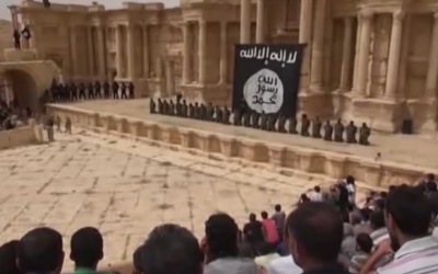 Image from an Islamic State video showing the mass execution of Syrian soldiers on the stage of the amphitheater in the ancient city of Palmyra, Syria shortly after the group captured the city on May 21, 2015. (screen grab: YouTube) Image from an Islamic State video showing the mass execution of Syrian soldiers on the stage of the amphitheater in the ancient city of Palmyra, Syria shortly after the group captured the city on May 21, 2015. (screen grab: YouTube)
