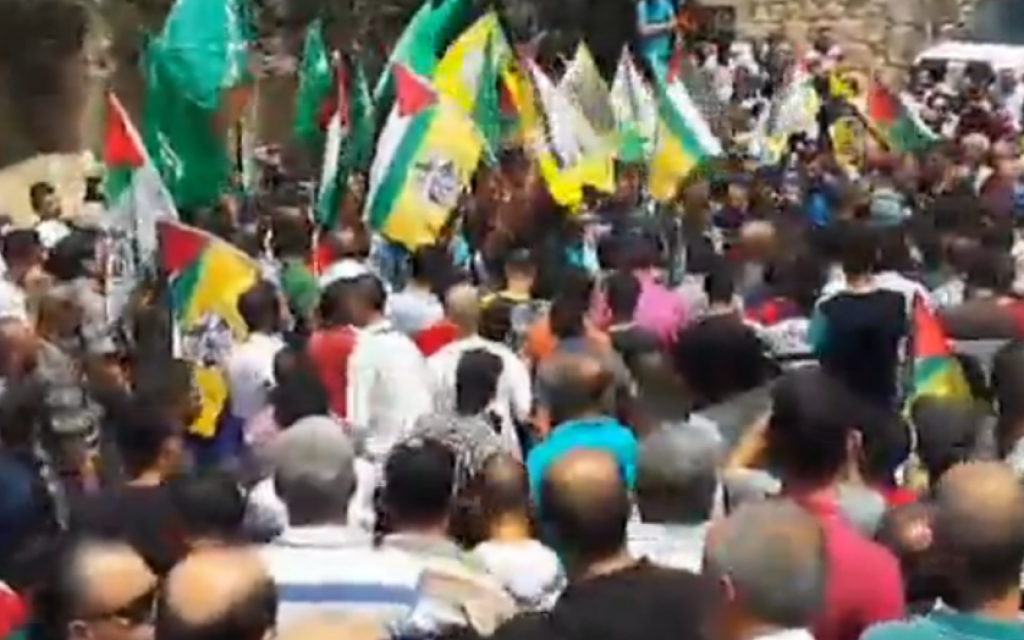 Mourners at the West Bank funeral of Ali Saad Dawabsha, burned to death in an arson attack, July 31, 2015 (Ynet screenshot)