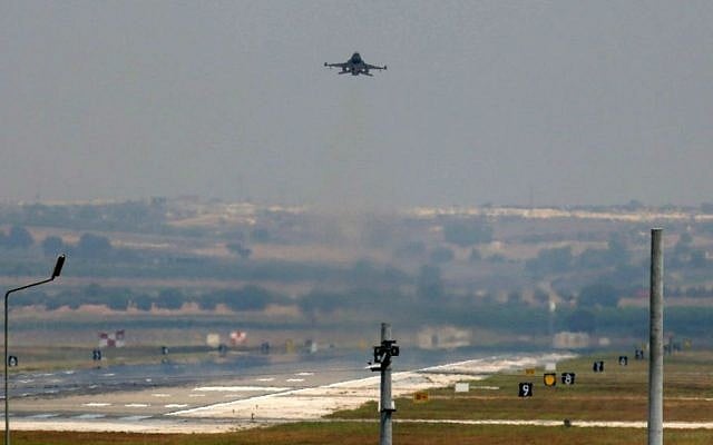 A Turkish Air Force warplane takes off from the Incirlik Air Base, on the outskirts of the city of Adana, southeastern Turkey, Tuesday, July 28, 2015. (AP Photo/Emrah Gurel)