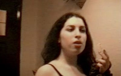 A scene from "Amy," showing Winehouse as a carefree 14-year-old singing Happy Birthday to a close friend (screen capture: YouTube) A scene from "Amy," showing Winehouse as a carefree 14-year-old singing Happy Birthday to a close friend (screen capture: YouTube)