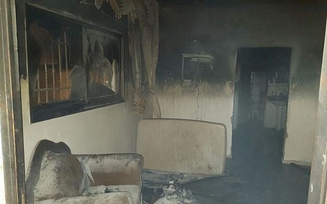 The burned-down home of the Dawabsha family in the Palestinian village of Duma, near Nablus, July 31, 2015 (Zacharia Sadeh/Rabbis for Human Rights)
