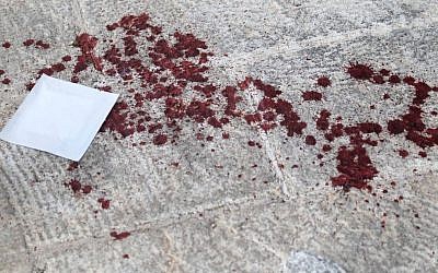 Bloodstained sidewalk at the scene of a stabbing at the annual Jerusalem Pride Parade on July 30, 2015. (Eric Cortellessa/Times of Israel) Bloodstained sidewalk at the scene of a stabbing at the annual Jerusalem Pride Parade on July 30, 2015. (Eric Cortellessa/Times of Israel)