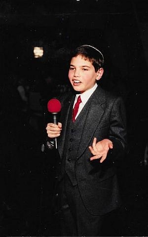 Joel Chasnoff performing stand up at his bar mitzvah (courtesy)