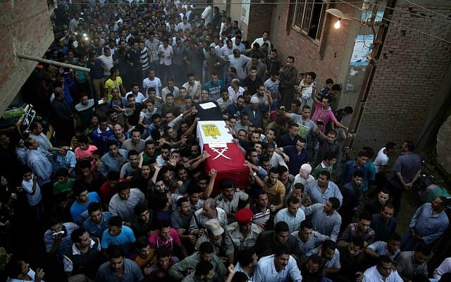 Egyptians carry the coffin of 1st Lt. Mohammed Adel Abdel Azeem -- killed on July 1, 2015, in an attack by Islamic extremists in the Sinai -- during the funeral procession in his home village of Tant al-Jazeera, north of Cairo, Egypt, July 2, 2015. (Hassan Ammar) Egyptians carry the coffin of 1st Lt. Mohammed Adel Abdel Azeem -- killed on July 1, 2015, in an attack by Islamic extremists in the Sinai -- during the funeral procession in his home village of Tant al-Jazeera, north of Cairo, Egypt, July 2, 2015. (Hassan Ammar)
