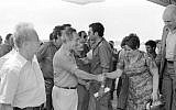 Shimon Peres and Yitzhak Rabin greet the freed hostages on July 4, 1976 (courtesy of IDF Archive)