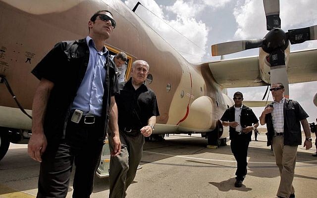 Prime Minister Benjamin Netanyahu walks out of a C-130 Hercules aircraft, used in the raid to release Israeli hostages held at Entebbe airport in Uganda in 1976, during a visit to Hatzerim Air base near Beersheba in 2009. (Photo by Edi Israel/Flash90) Prime Minister Benjamin Netanyahu walks out of a C-130 Hercules aircraft, used in the raid to release Israeli hostages held at Entebbe airport in Uganda in 1976, during a visit to Hatzerim Air base near Beersheba in 2009. (Photo by Edi Israel/Flash90)