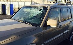 Illustrative. The windshield of an IDF military vehicle is shattered by Palestinian stone-throwers in the West Bank, July 3, 2015. (IDF Spokesperson's Unit)