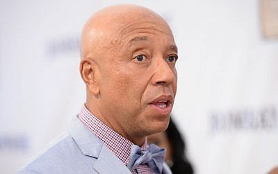Russell Simmons attends the RUSH Philanthropic Arts Foundation’s Art for Life Benefit at Fairview Farms in Water Mill on Saturday, July 18, 2015, in New York. (Scott Roth/Invision/AP)