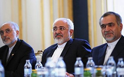 Iranian Foreign Minister Mohammad Javad Zarif (C), the Head of the Iranian Atomic Energy Organization Ali Akbar Salehi (L) and Hossein Fereydoon (R), brother and close aide to President Hassan Rouhani, are pictured during a meeting with the US Secretary of State in Vienna on July 3, 2015 (AFP/POOL/CARLOS BARRIA) 