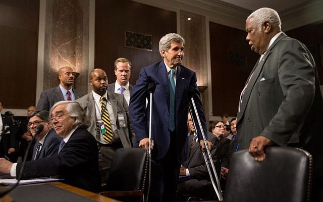 Secretary of State John Kerry, center, Secretary of Energy Ernest Moniz, seated second from left, and Secretary of Treasury Jack Lew, seated left, arrive to testify at a Senate Foreign Relations Committee hearing on Capitol Hill, in Washington, Thursday, July 23, 2015, to review the Iran nuclear agreement. (AP Photo/Andrew Harnik)