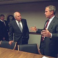 Then-president George W. Bush talks to his vice president at the Emergency Operations Center in the White House on September 11, 2001. (photo credit: US National Archives)