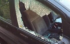 Car vandalized outside London's Skver Synagogue, July 2015 (Shomrim)