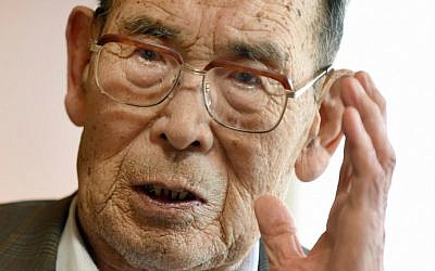 In this photo taken on June 25, 2015, former Japanese fighter pilot Kaname Harada, 98, gestures as he tells his experience during World War II at his home in Nagano, Japan. (AFP Photo/Toru Yamanaka)