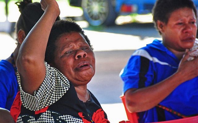 Grieving relatives of the missing Trigana Air ATR 42-300 aircraft and feared to have crashed cry as they wait for information at the crisis center in Jayapura on August 17, 2015. (AFP PHOTO / INDRAYADI THAMRIN) Grieving relatives of the missing Trigana Air ATR 42-300 aircraft and feared to have crashed cry as they wait for information at the crisis center in Jayapura on August 17, 2015. (AFP PHOTO / INDRAYADI THAMRIN)