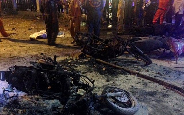 Destroyed motorbikes pictured at the scene of devastation after a bomb exploded outside a religious shrine in central Bangkok, August 17, 2015. (AFP/AIDAN JONES) Destroyed motorbikes pictured at the scene of devastation after a bomb exploded outside a religious shrine in central Bangkok, August 17, 2015. (AFP/AIDAN JONES)