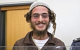 Meir Ettinger, the head of a Jewish extremist group, stands at the Israeli justice court in Nazareth Illit on August 4, 2015. (AFP PHOTO / JACK GUEZ)