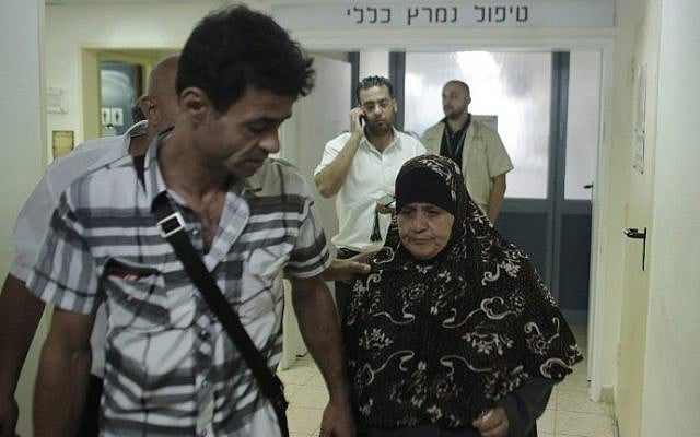Maazouze Allaan (R), the mother of Palestinian prisoner Mohammed Allaan, walks outside her son's room following a visit to the Barzilai Medical Center in the Israeli city of Ashkelon on August 20, 2015. (Ahmad Gharabli/AFP) Maazouze Allaan (R), the mother of Palestinian prisoner Mohammed Allaan, walks outside her son's room following a visit to the Barzilai Medical Center in the Israeli city of Ashkelon on August 20, 2015. (Ahmad Gharabli/AFP)