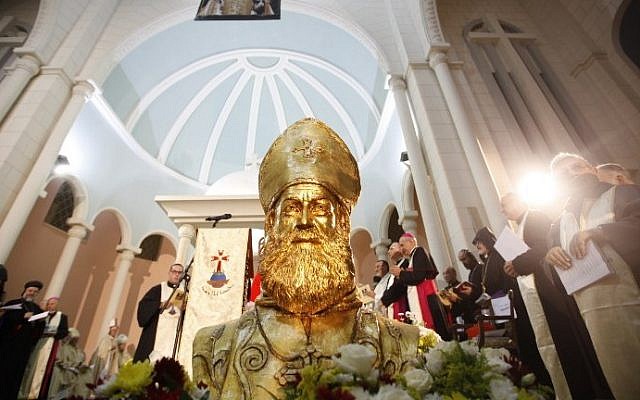 A statue of Syriac Catholic Bishop Flavianus Michael Melki, martyred during the "Assyrian Genocide," is seen during his beatification at the Patriarchal convent of Our Lady of Deliverance in Harissa, Lebanon, north of Beirut, August 29, 2015. (AFP PHOTO/EZZAT ATTAR)