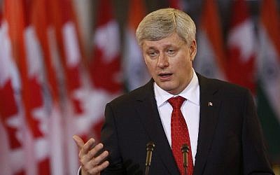 Canada's Prime Minister Stephen Harper speaks on Parliament Hill in Ottawa, Canada on April 15, 2015. (AFP Photo/Cole Burston)