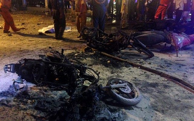 Destroyed motorbikes are pictured at the scene of devastation after a bomb exploded outside a religious shrine in central Bangkok late on August 17, 2015. (AFP PHOTO / AIDAN JONES) Destroyed motorbikes are pictured at the scene of devastation after a bomb exploded outside a religious shrine in central Bangkok late on August 17, 2015. (AFP PHOTO / AIDAN JONES)