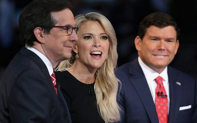 FOX News anchors (L-R) Chris Wallace, Megyn Kelly and Bret Baier moderate the first prime-time Republican presidential debate hosted at the Quicken Loans Arena August 6, 2015 in Cleveland, Ohio (Chip Somodevilla/Getty Images/AFP) 