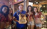Matthew Kuppe (center) in a Facebook post dated Aug. 9, 2015 with the caption, “This is how you celebrate 21!” (Screen capture Facebook)