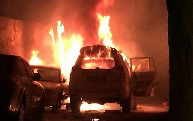 Illustrative: A Border Police car on fire after Palestinians threw a Molotov cocktail at the vehicle, in Jerusalem on Wednesday, August 26, 2015. (Screen capture) Illustrative: A Border Police car on fire after Palestinians threw a Molotov cocktail at the vehicle, in Jerusalem on Wednesday, August 26, 2015. (Screen capture)