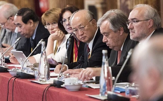 Yukiya Amano, center, attending an IAEA meeting in Paris in April 2015. (UN/Mark Garten) Yukiya Amano, center, attending an IAEA meeting in Paris in April 2015. (UN/Mark Garten)