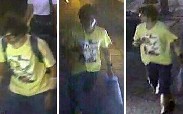 This Aug. 17, 2015, image, released by Royal Thai Police spokesman Lt. Gen. Prawut Thavornsiri shows a man wearing a yellow T-shirt near the Erawan Shrine before an explosion occurred in Bangkok, Thailand. (Royal Thai Police via AP)
