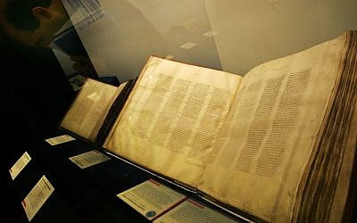 A Codex Sinaiticus manuscript, right, the earliest complete New Testament, from 4th century Egypt or Judea on display in the 'Sacred : Discover what we share' exhibition at the British Library in London, Wednesday, April 25, 2007 (AP Photo/Sang Tan)