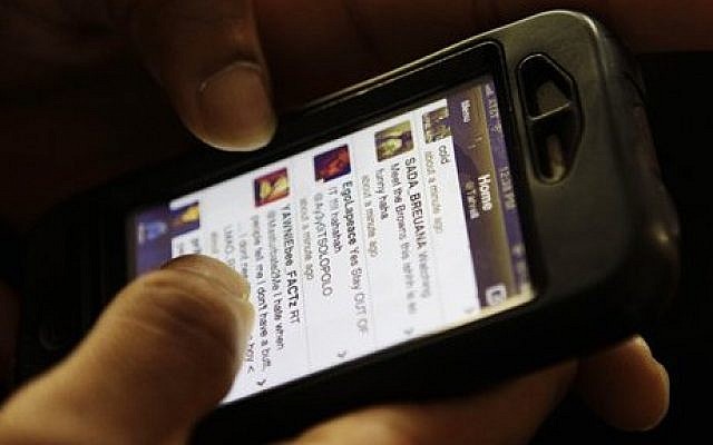 Illustrative: Browsing on a phone  (Frank Franklin II/AP)