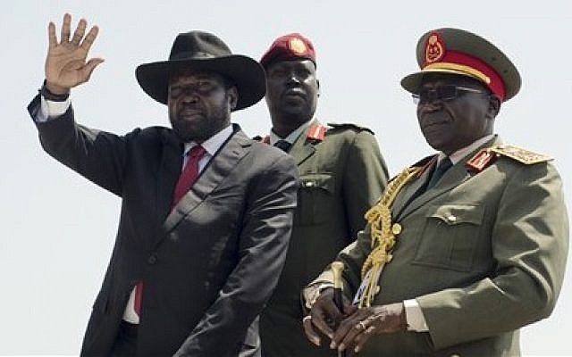 South Sudan's President Salva Kiir, left, accompanied by army chief of staff Paul Malong Awan, right, in the capital Juba, South Sudan, Thursday, July 9, 2015. (Jason Patinkin/AP) South Sudan's President Salva Kiir, left, accompanied by army chief of staff Paul Malong Awan, right, in the capital Juba, South Sudan, Thursday, July 9, 2015. (Jason Patinkin/AP)
