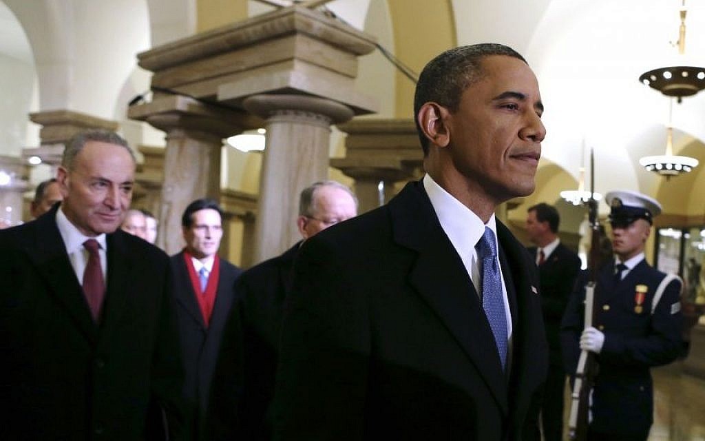 President Barack Obama, followed by Sen. Charles Schumer, D-N.Y., walks through the Capitol in Washington, Monday, Jan. 21, 2013, for his ceremonial swearing-in ceremony during the 57th Presidential Inauguration. (AP Photo/Molly Riley, Pool) President Barack Obama, followed by Sen. Charles Schumer, D-N.Y., walks through the Capitol in Washington, Monday, Jan. 21, 2013, for his ceremonial swearing-in ceremony during the 57th Presidential Inauguration. (AP Photo/Molly Riley, Pool)