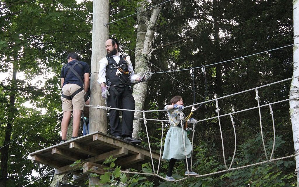Visitors on a ropes course  at Jiminy Peak in August 2015. (JTA/Uriel Heilman)