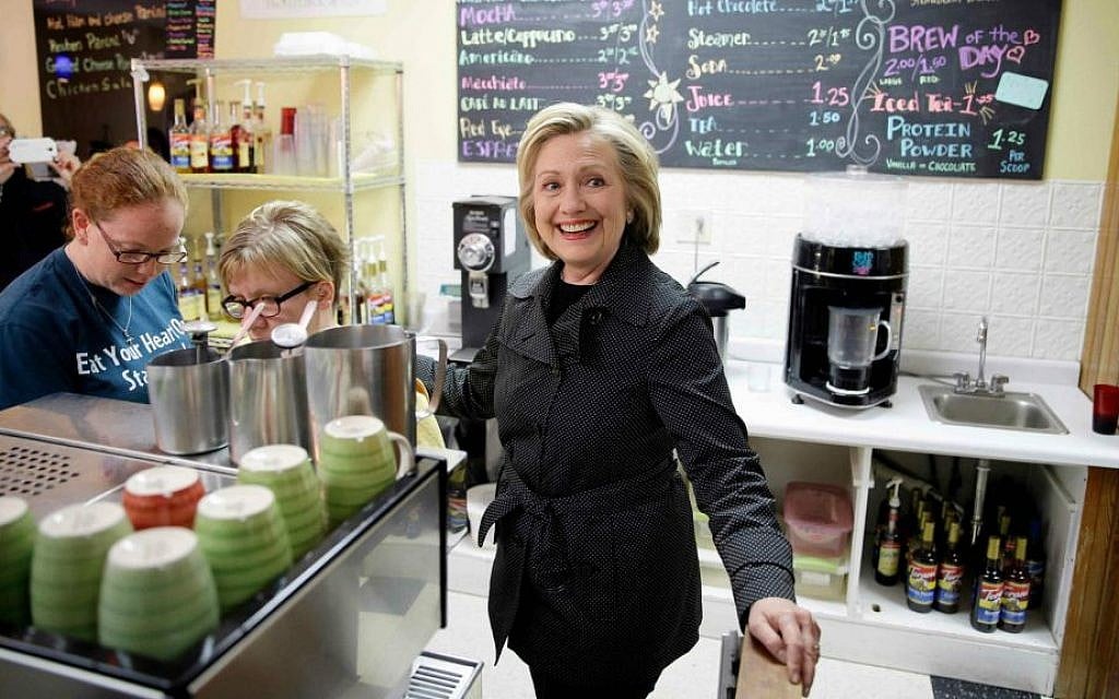 File: Democratic presidential candidate Hillary Rodham Clinton visits Em's Coffee Co. in Independence, Iowa, May 19, 2015. (AP Photo/Charlie Neibergall, File)