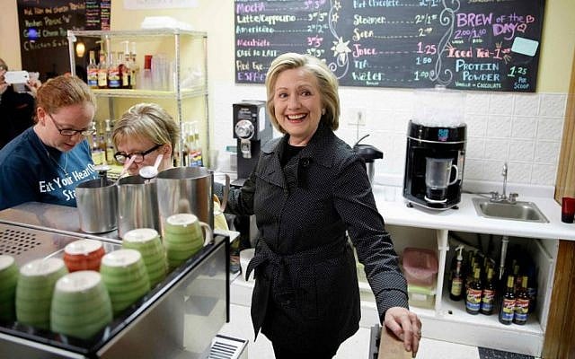 File: Democratic presidential candidate Hillary Rodham Clinton visits Em's Coffee Co. in Independence, Iowa, May 19, 2015. (AP Photo/Charlie Neibergall, File)