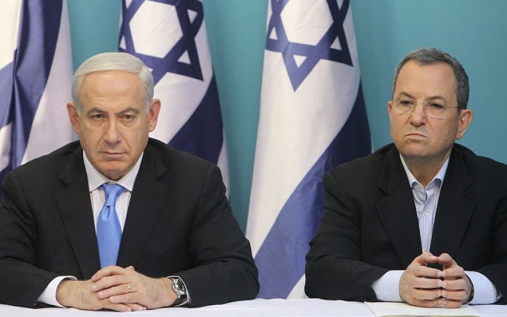 Prime Minister Benjamin Netanyahu and then-defense minister Ehud Barak attend a press conference at the PM's office in Jerusalem, November 21, 2012. (Miriam Alster/Flash90)