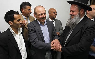 Israeli Likud and Shas party members meet with senior Palestinian officials Yasser Abed Rabbo and Nabil Shaath at the PLO offices in Ramallah, July 7, 2013 (Mati Milstein/Flash90)