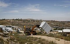 Illustrative photo of Israeli security forces demolishing an illegally built structure in a West Bank outpost (Miriam Alster/Flash 90)