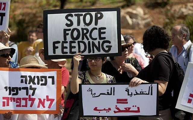 Israeli Doctors for Human Rights protest near the Knesset in Jerusalem against force feeding, June 16, 2014. (Flash90) Israeli Doctors for Human Rights protest near the Knesset in Jerusalem against force feeding, June 16, 2014. (Flash90)