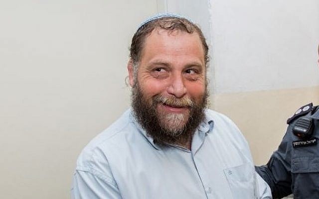 Lehava chairman Bentzi Gopstein is brought to the Jerusalem Magistrate's Court on December 16, 2014. (Yonatan Sindel/Flash90) Lehava chairman Bentzi Gopstein is brought to the Jerusalem Magistrate's Court on December 16, 2014. (Yonatan Sindel/Flash90)