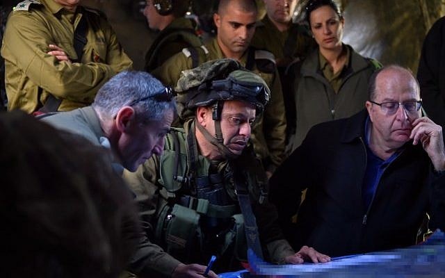 Defense Minister Moshe Ya'alon seen with Colonel Asher Ben-Lulu, commander of the IDF's Kfir infantry brigade, during an army exercise in the Golan Heights on April 02, 2015. (Ariel Hermoni/Ministry of Defense) Defense Minister Moshe Ya'alon seen with Colonel Asher Ben-Lulu, commander of the IDF's Kfir infantry brigade, during an army exercise in the Golan Heights on April 02, 2015. (Ariel Hermoni/Ministry of Defense)