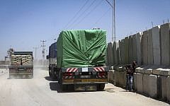 File: A truck carrying cement is seen after it entered the southern Gaza Strip from Israel through the Kerem Shalom crossing in Rafah, on April 29, 2015. (Abed Rahim Khatib/Flash 90)