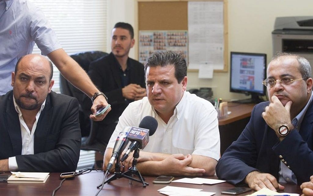 Leader of the Joint (Arab) List MK Ayman Odeh (center) seen with MK Masud Gnaim (left), and MK Ahmad Tibi (right) in the Knesset, Jerusalem, June 29, 2015. (Miriam Alster/Flash90) Leader of the Joint (Arab) List MK Ayman Odeh (center) seen with MK Masud Gnaim (left), and MK Ahmad Tibi (right) in the Knesset, Jerusalem, June 29, 2015. (Miriam Alster/Flash90)