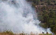 A fire rages between Tzur Hadassah and the West Bank settlement of Beitar Illit area on August 2, 2015. (Nati Shohat/Flash90)