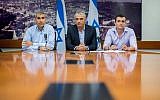 Finance Minister Moshe Kahlon, center, with Finance Ministry director general Shai Babad, right, and ministry budget head Amir Levi as they present the proposal for the state budget for 2015 in Jerusalem, August 2, 2015. (Yonatan Sindel/Flash90)