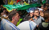 Palestinian men carry the body of Saad Dawabsha, the father of a Palestinian toddler killed last week when their home was firebombed by perpetrators suspected to be Jewish extremists, during his funeral in the West Bank village of Duma on August 08, 2015. (FLASH90)
