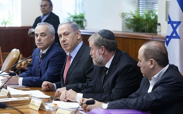 Prime Minister Benjamin Netanyahu, second left, and Minister Yuval Steinitz, left, attend the weekly cabinet meeting at Netanyahu's office in Jerusalem on August 16, 2015. (Marc Israel Sellem/POOL) Prime Minister Benjamin Netanyahu, second left, and Minister Yuval Steinitz, left, attend the weekly cabinet meeting at Netanyahu's office in Jerusalem on August 16, 2015. (Marc Israel Sellem/POOL)