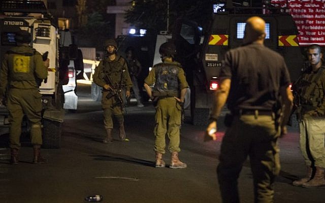Illustrative photo of IDF soldiers and security personnel at the scene where an Israeli soldier was wounded by an explosive device at the Panorama military post near Beit Jala, south of Jerusalem, August 19, 2015. (Hadas Parush/Flash90) Illustrative photo of IDF soldiers and security personnel at the scene where an Israeli soldier was wounded by an explosive device at the Panorama military post near Beit Jala, south of Jerusalem, August 19, 2015. (Hadas Parush/Flash90)